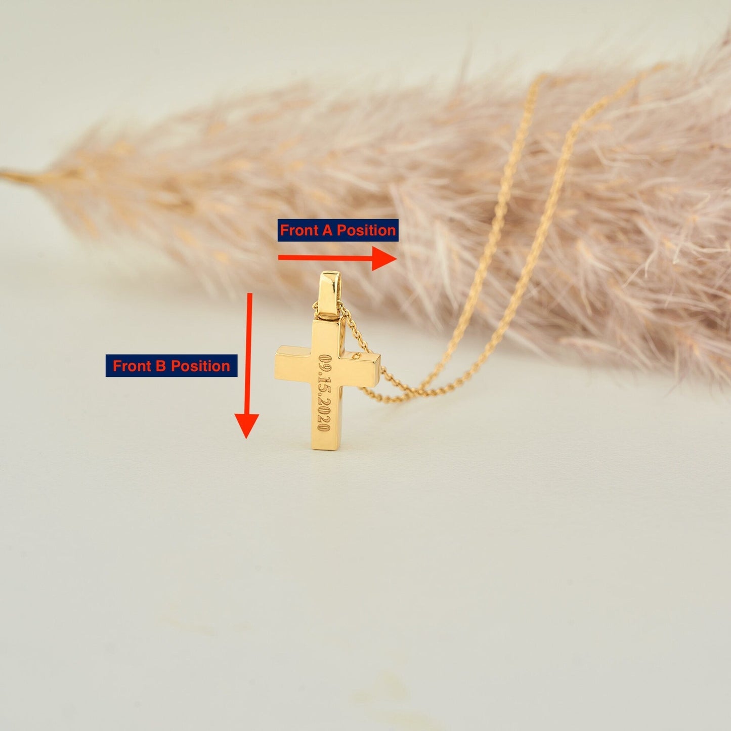 Gold Cremation Jewelry Displayed on Marble Background