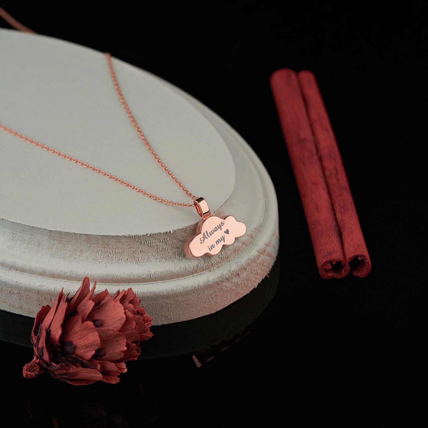 Rose gold cloud urn necklace on chain, perfect for holding cherished ashes