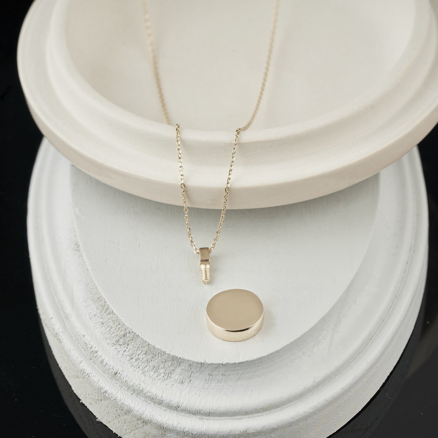 Simple round silver pendant on a delicate chain for a Gold Cremation Urn Necklace
