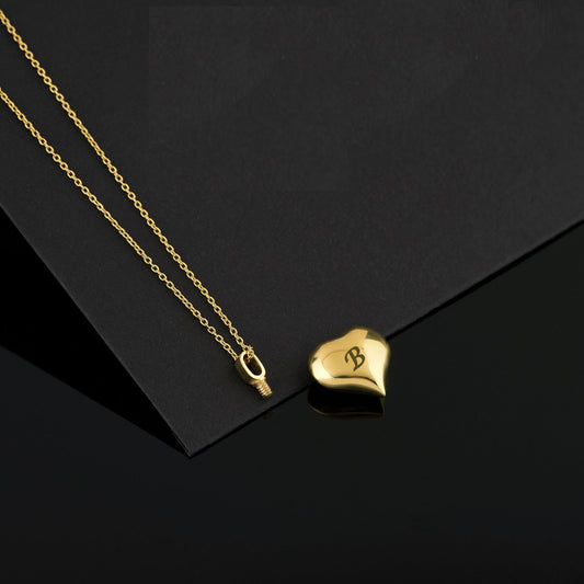14K Gold Cremation Heart Pendant on a delicate chain necklace for cherished memories