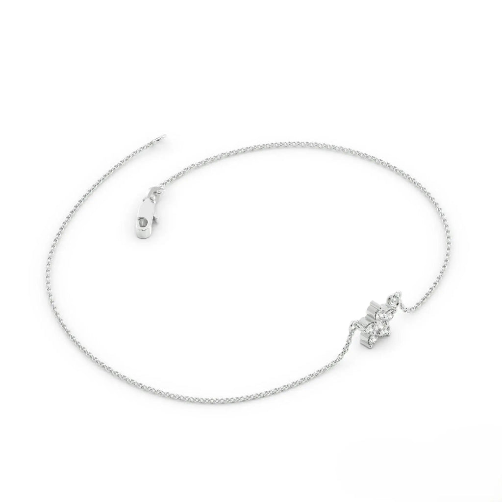Delicate silver chain necklace with crystal accent alongside 14k Gold Floral Diamond Bracelet