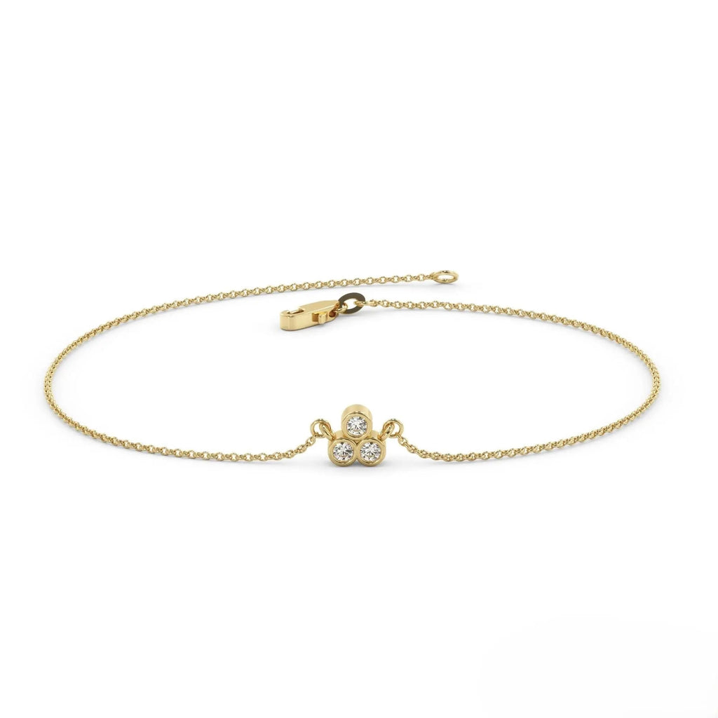 Delicate gold diamond bracelet with paw print charm and diamond accents for elegant gifting
