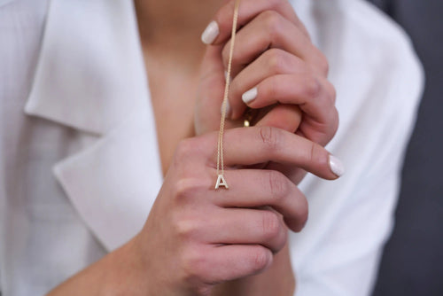 Delicate 14K Solid Gold necklace featuring a tiny Eiffel Tower pendant