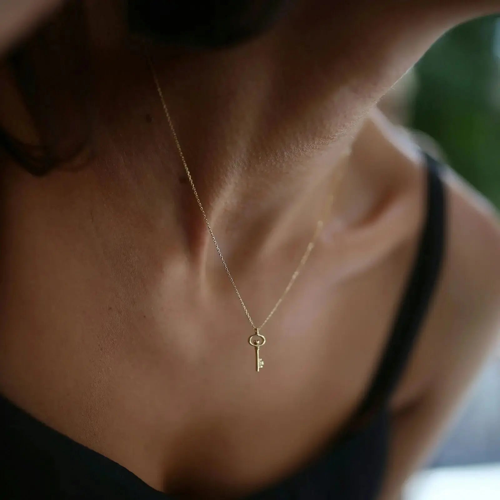 Delicate gold key pendant on a thin chain from the Key Necklace 14K Solid collection