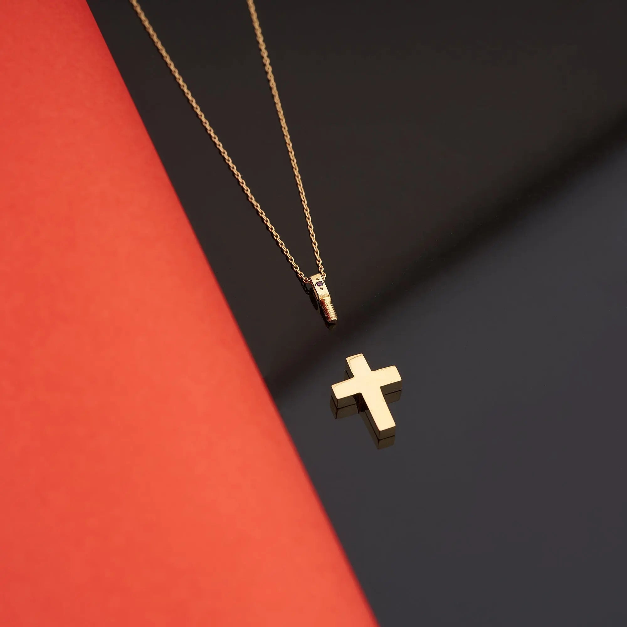 Closeup Detail of Gold Cross Urn Pendant