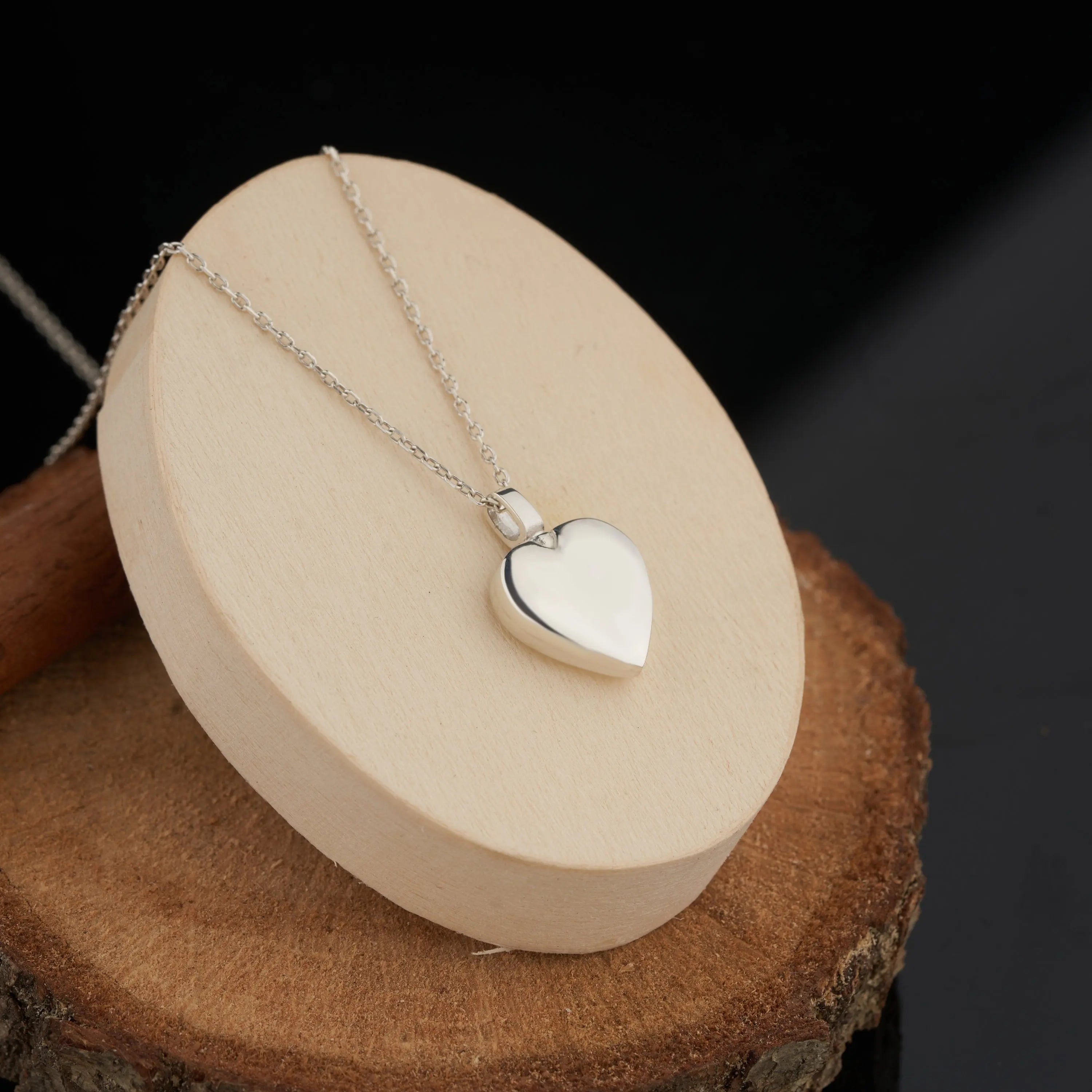 Silver heart-shaped locket pendant on a delicate chain for Solid Gold Mom Dad Heart Urn