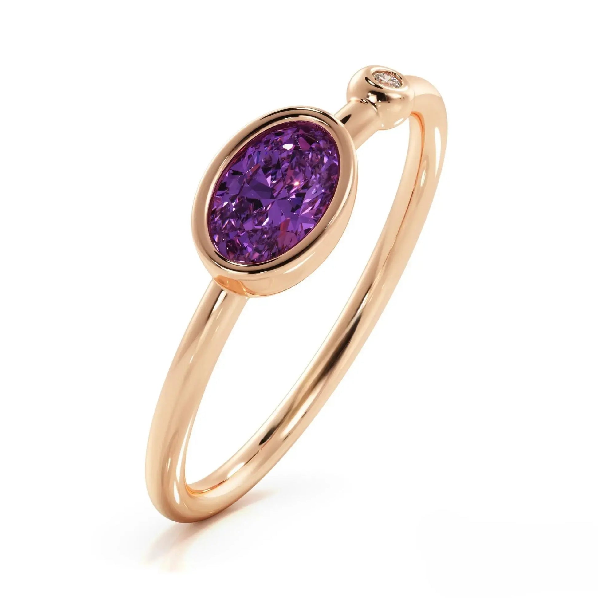 Rose gold ring featuring an oval purple amethyst in a gold amethyst diamond ring