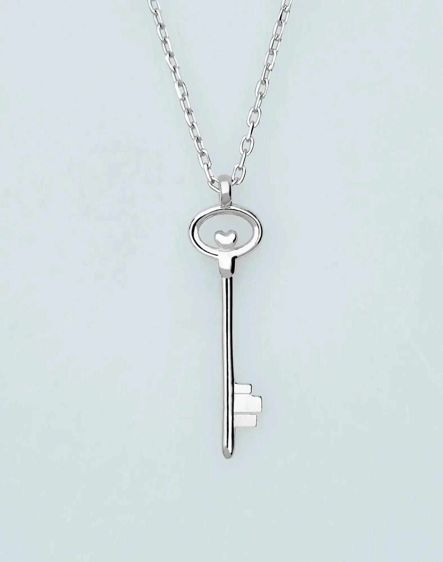 Silver key pendant on a delicate chain from the Key Necklace 14K Solid Gold collection