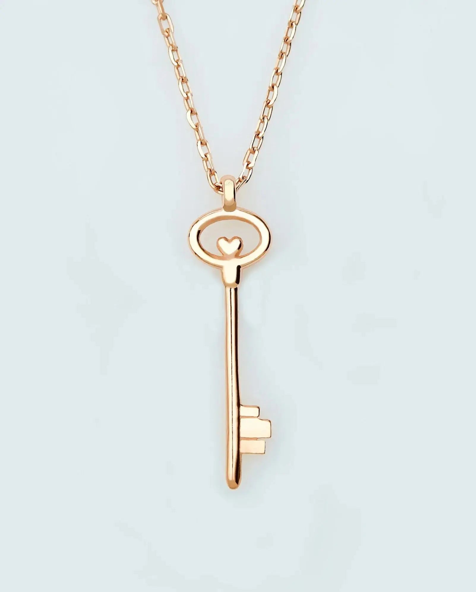 Rose gold key pendant necklace with heart design, featuring a key necklace 14K solid