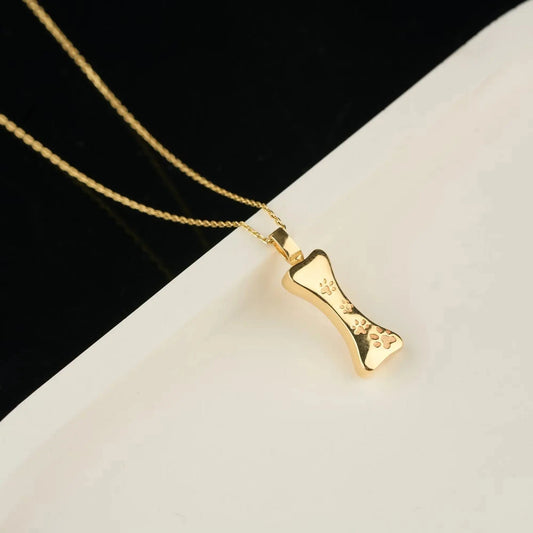 Gold-plated bone pendant necklace with delicate chain and extension chain for pet ashes
